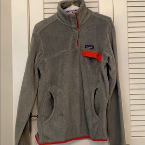 Pink and grey Patagonia sweater.